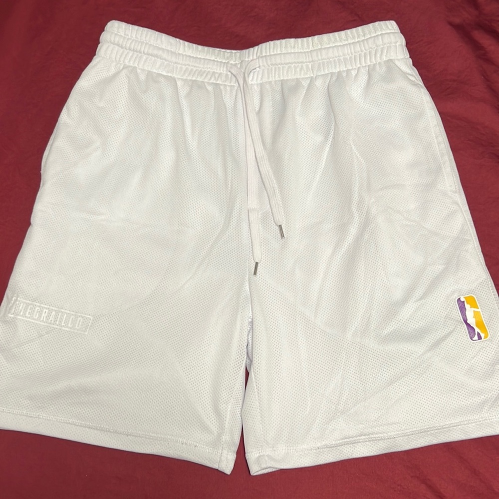 The Grail Company white shorts